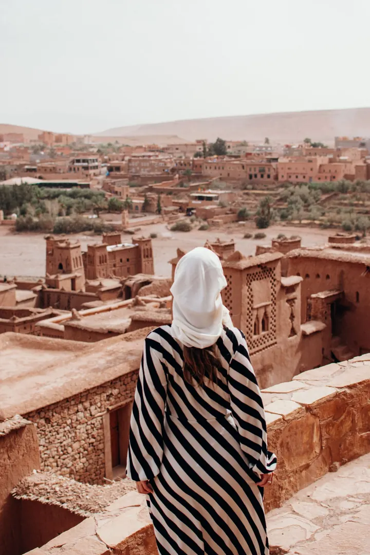 Woman looking over a kasbah