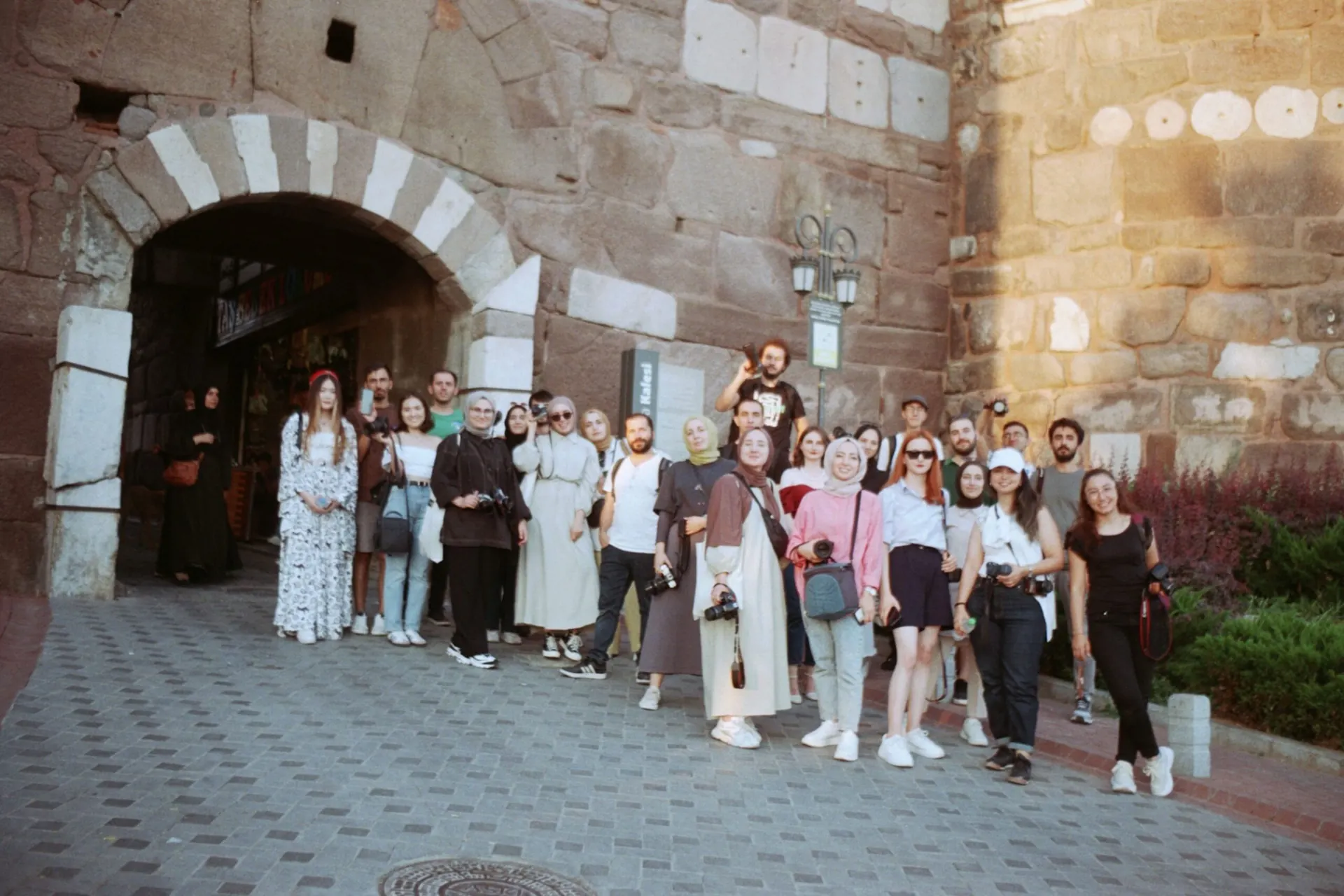 A student group in front of a Moroccan gate